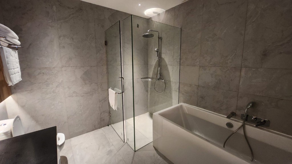 Family suite bathroom with shower and tub